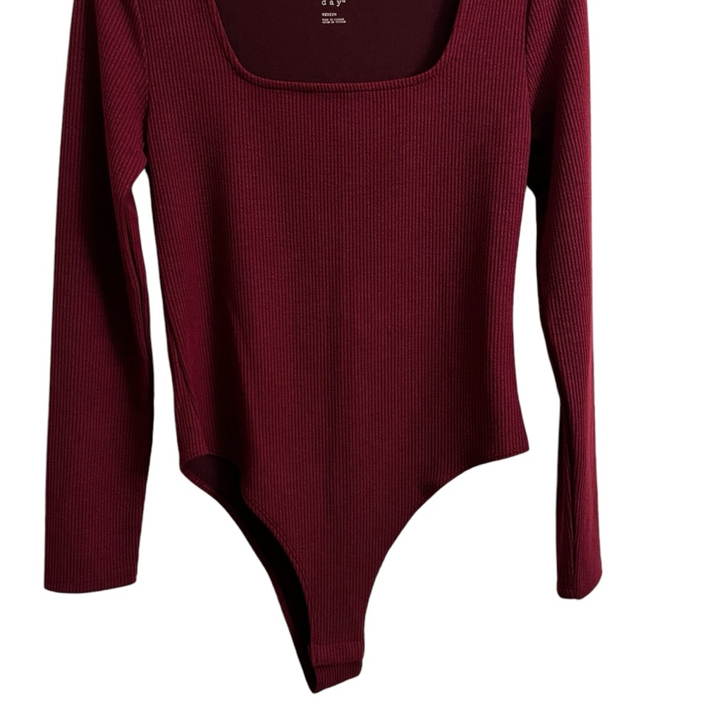 Long sleeve body suit size medium